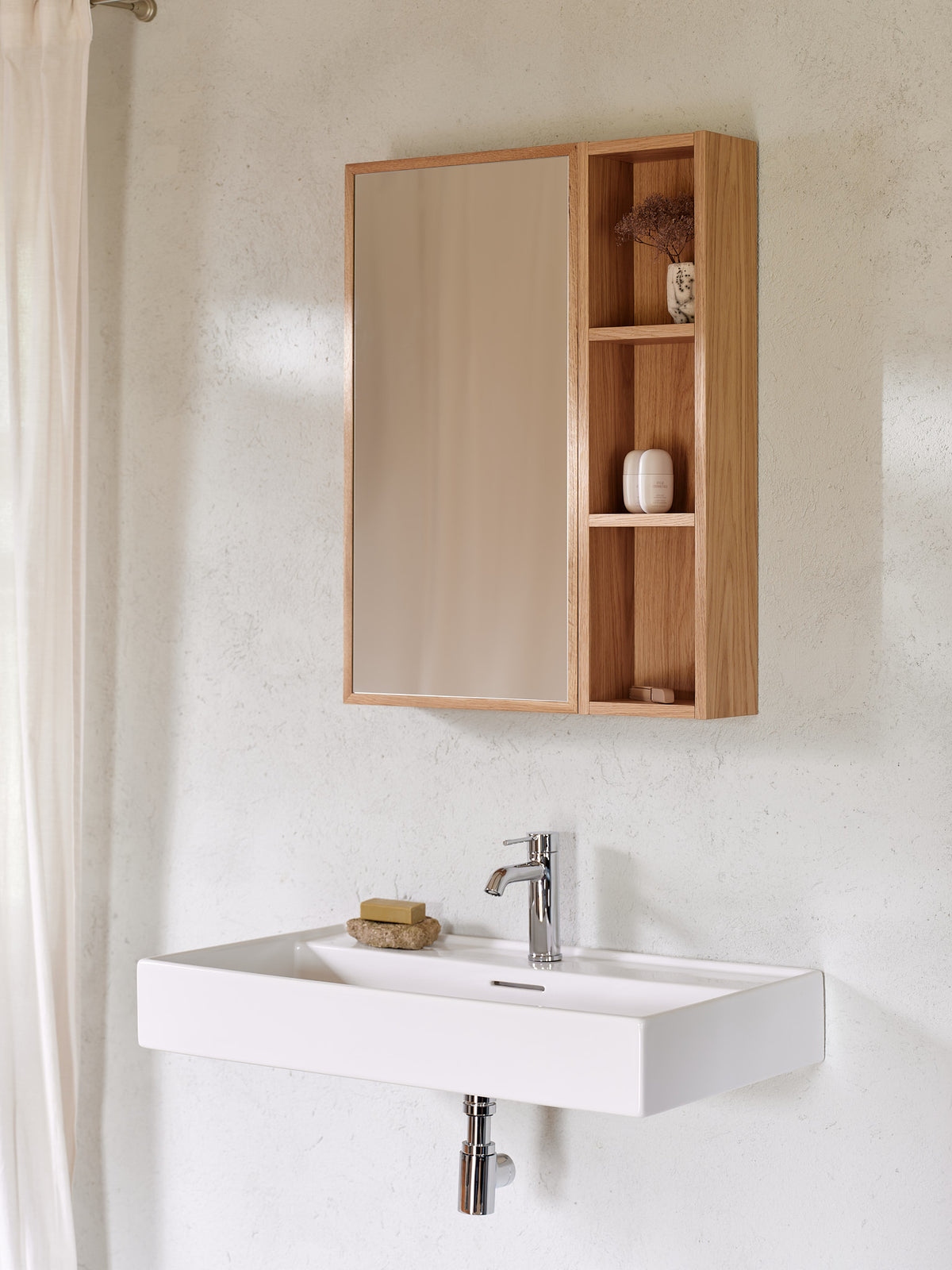 Wall mounted open oak bathroom cabinet with shelves in a modular bathroom furniture composition 